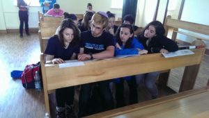 image of Marchers studying Talmud at the Chachma Yeshiva in Lublin.