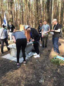 Image of MOTL students visit Tycochin in April 2018, town and burial pits where Jews were shot.